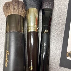 3 make up brushes one Guerlain and 2 Lancome